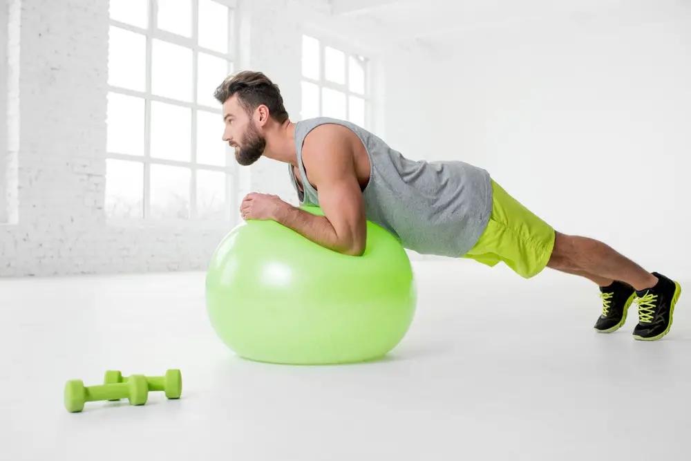 Plank using a Ball Get a stability ball